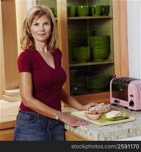 Portrait of a mature woman standing in the kitchen