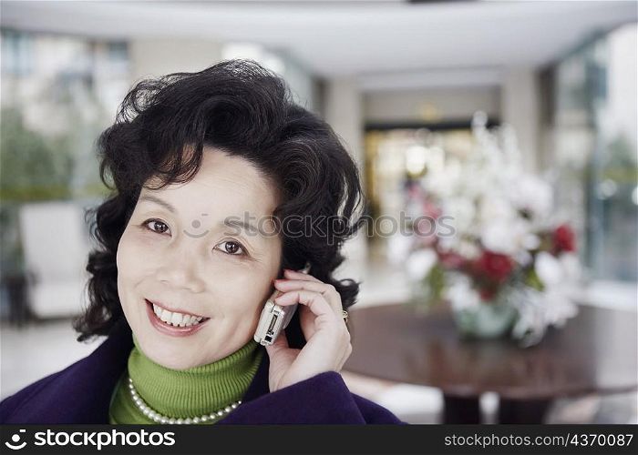 Portrait of a mature woman talking on a mobile phone