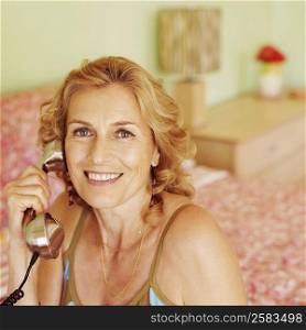Portrait of a mature woman talking on the telephone