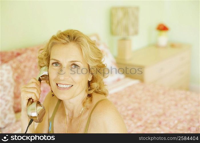 Portrait of a mature woman talking on the telephone