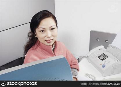 Portrait of a mature woman using a computer