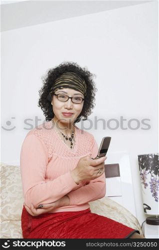 Portrait of a mature woman using a mobile phone