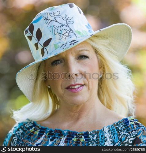 Portrait of a mature woman wearing a hat