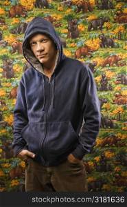 Portrait of a Mid-adult Caucasian male wearing a hoodie.