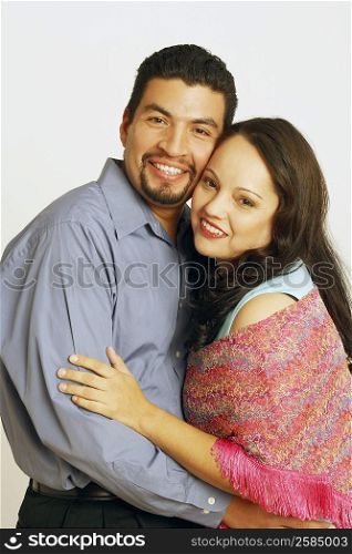 Portrait of a mid adult couple embracing