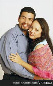 Portrait of a mid adult couple embracing