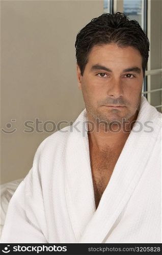 Portrait of a mid adult man in a bathrobe