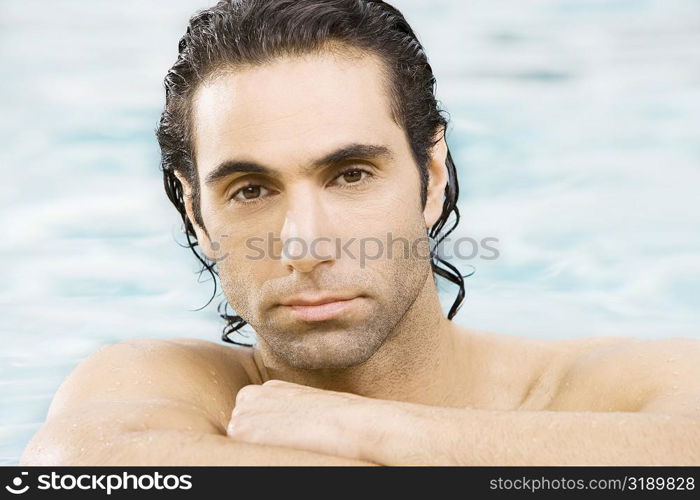 Portrait of a mid adult man in a swimming pool