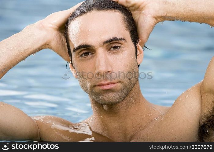 Portrait of a mid adult man in a swimming pool