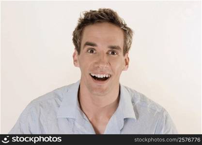 Portrait of a mid adult man laughing