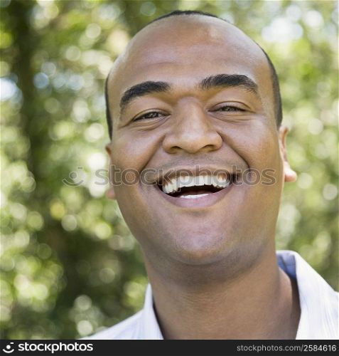 Portrait of a mid adult man laughing
