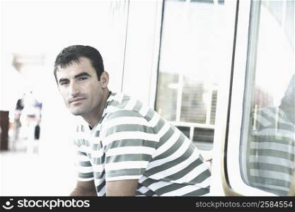 Portrait of a mid adult man on a sailing ship