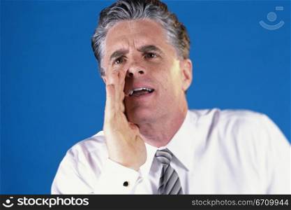 Portrait of a mid adult man shouting