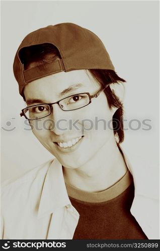 Portrait of a mid adult man smiling and wearing eyeglasses