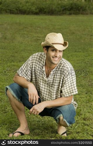 Portrait of a mid adult man smiling in the garden