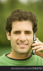 Portrait of a mid adult man talking on a mobile phone