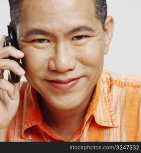 Portrait of a mid adult man using a mobile phone