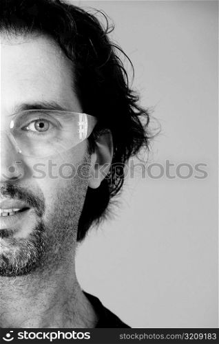 Portrait of a mid adult man wearing protective eyewear
