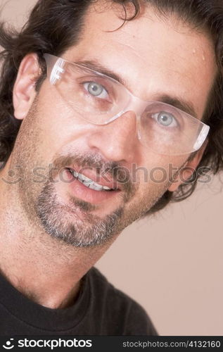 Portrait of a mid adult man wearing protective eyewear