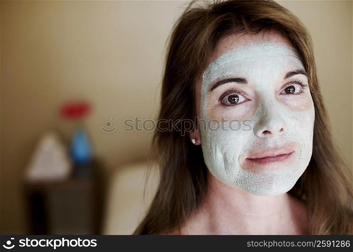 Portrait of a mid adult woman having a facial