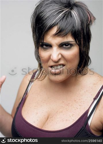 Portrait of a mid adult woman looking angry