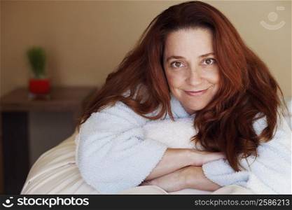 Portrait of a mid adult woman lying on a massage table