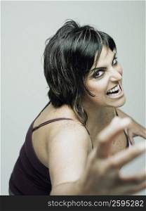 Portrait of a mid adult woman shouting