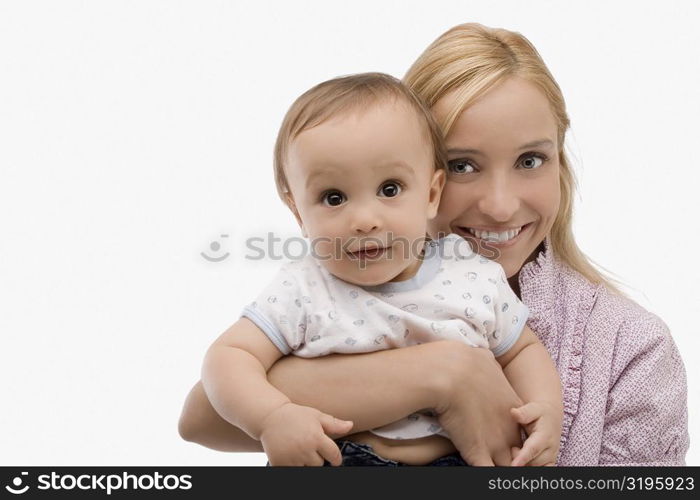 Portrait of a mid adult woman smiling with her son