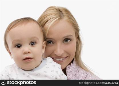 Portrait of a mid adult woman smiling with her son