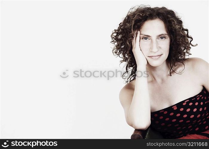 Portrait of a mid adult woman smirking