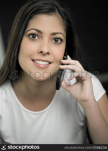 Portrait of a mid adult woman using a mobile phone