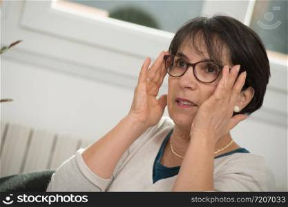 portrait of a middle age brunette with glasses