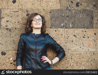 Portrait of a modern young woman, urban background