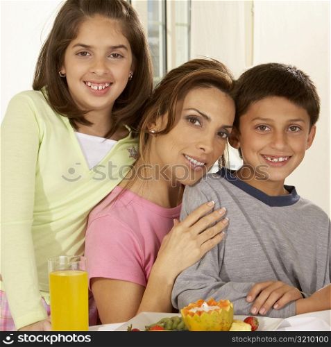 Portrait of a mother and her two children