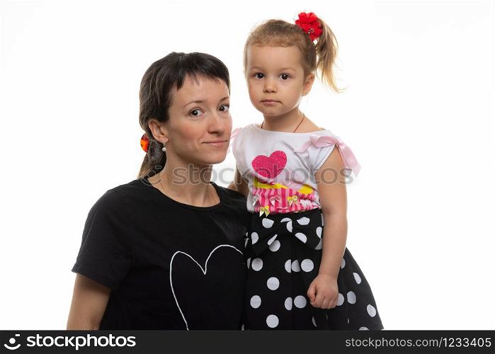 Portrait of a mother with a four-year-old daughter on a white background