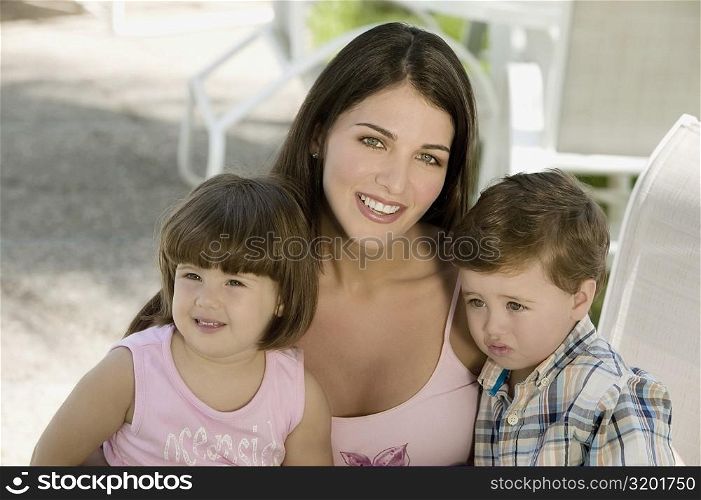 Portrait of a mother with her two children
