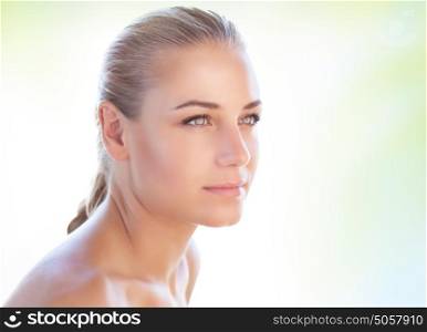 Portrait of a nice blond woman over clear background, conceptual photo of natural beauty and skin care, day spa