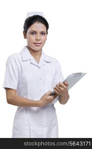 Portrait of a nurse with a clipboard