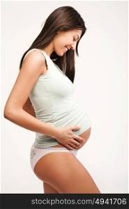 Portrait of a pregnant mother - isolated, white background