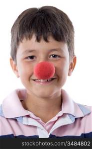 Portrait of a pretty child with a clown nose isolated on white