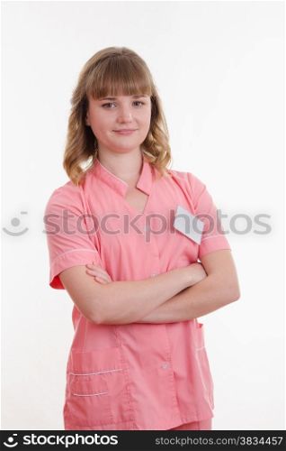 Portrait of a pretty girl medical worker on a white background