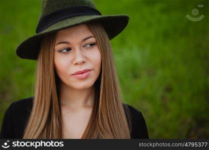 Portrait of a pretty girl wearing hat