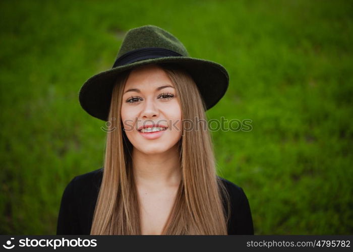 Portrait of a pretty girl wearing hat