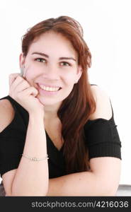 Portrait of a pretty young businesswoman at the office desk holding a pen against white background