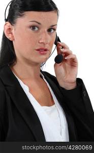 Portrait of a receptionist wearing a headset