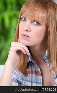 Portrait of a red haired woman