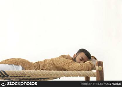 PORTRAIT OF A RURAL MAN SLEEPING COMFORTABLY