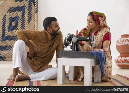 PORTRAIT OF A RURAL WIFE AND HUSBAND TALKING TO EACH OTHER