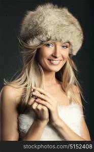 Portrait of a russian woman wearing a furry hat