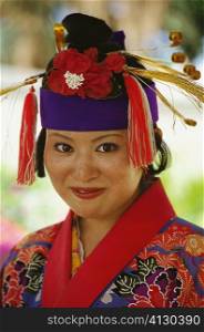 Portrait of a Ryukyu dancer smirking, Ishigaki, Okinawa Prefecture, Japan